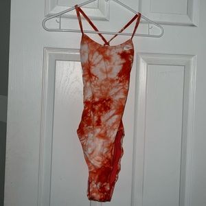 Orange tie dyed Nike swimsuit